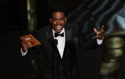 Actor Chris Rock performs at the 84th Annual Academy Awards on February 26, 2012 in Hollywood, California. 