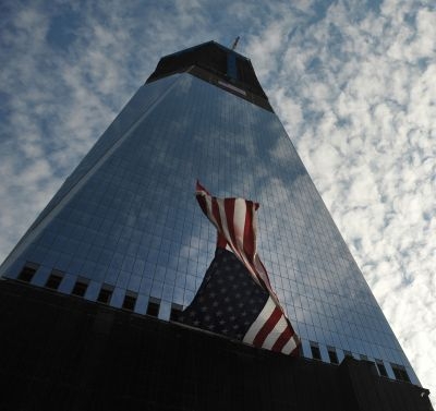 A US flag billows on Freedom Tower in New York City