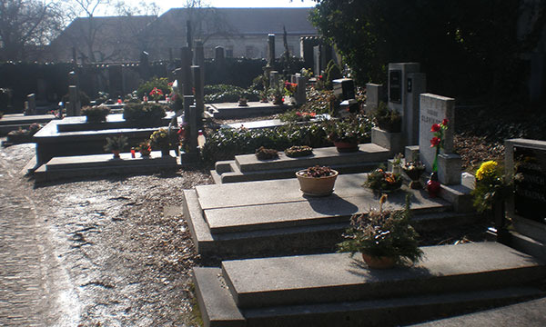 Neatly laid out graves in the courtyard