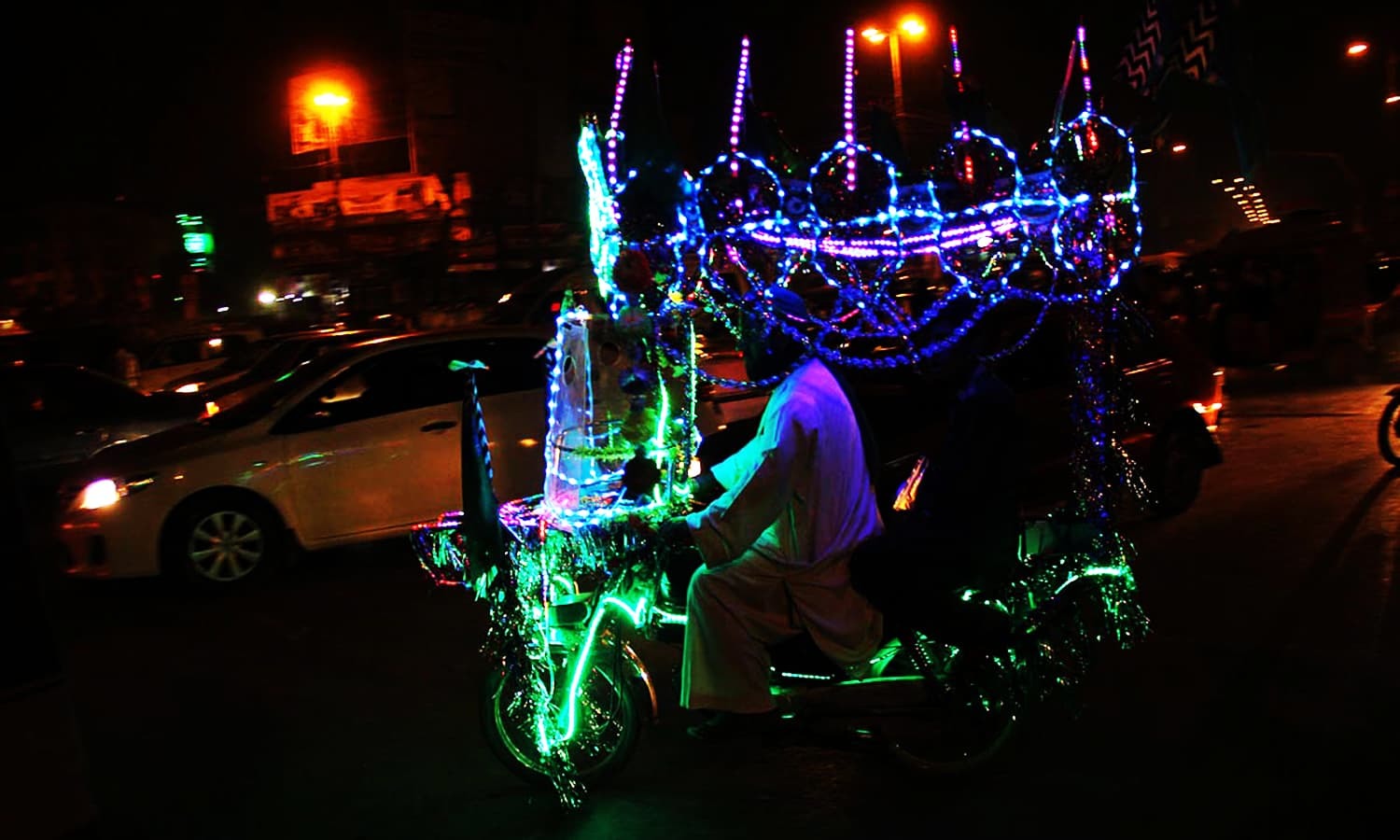 Px23-012 KARACHI: Dec23 - A view of a beautifully decorated vehicle in connection with Eid Milad un Nabi celebrations. ONLINE PHOTO by Sabir Mazhar