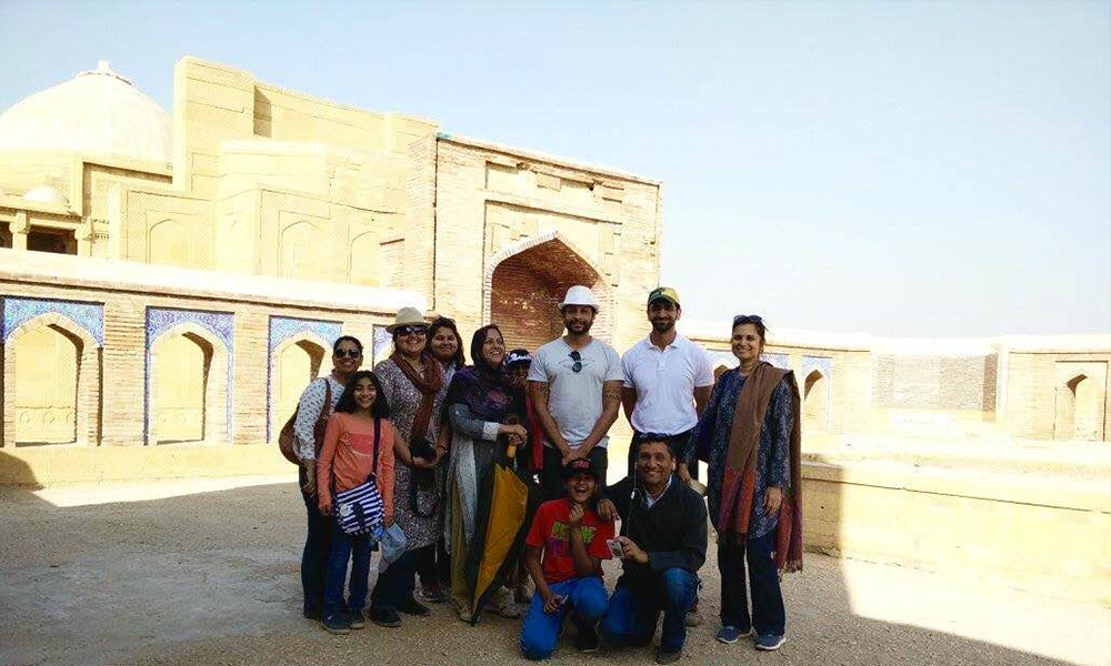Zain Mustafa with a group of tourist