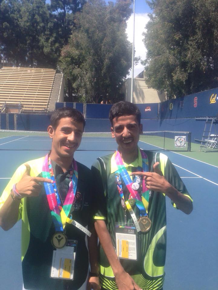 Muhammed Arif Qayyum and Ahsan Anwar with golden medal in Tennis Doubles
