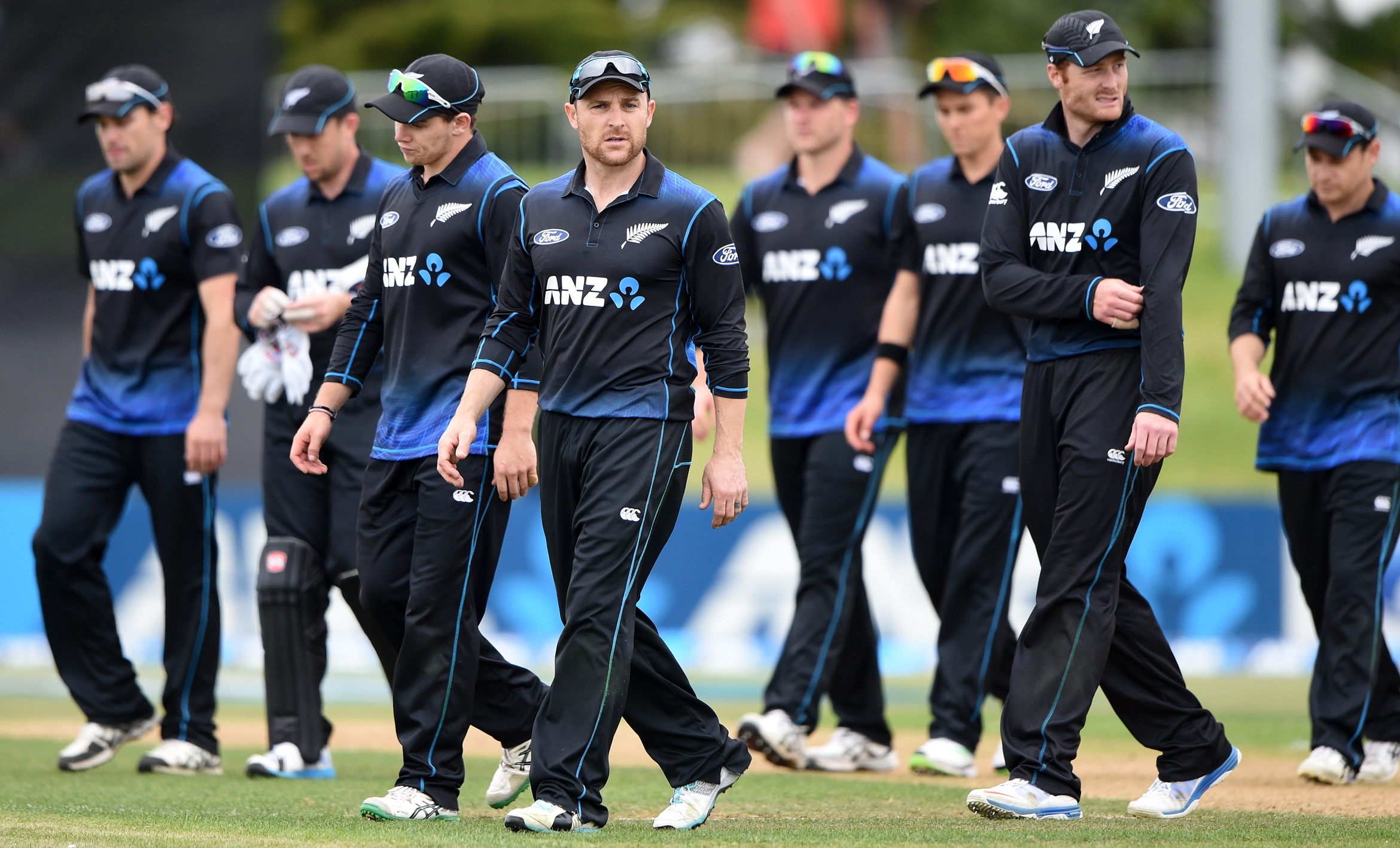 Brendon McCullum leads the players from the field after a comprehensive defeat in the first ODI. ANZ One Day International Cricket Series between New Zealand Back Caps and South Africa, Mount Maunganui, New Zealand. Tuesday 21 October 2014. Photo: Andrew Cornaga/www.Photosport.co.nz