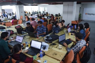 Pakistani employees of online marketplace company Kaymu at work in Karachi