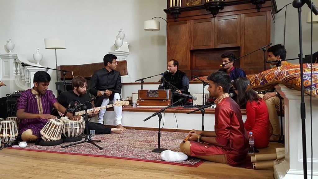 Rahat Ali Khan performs with the Oxford band, The Fusion Project.