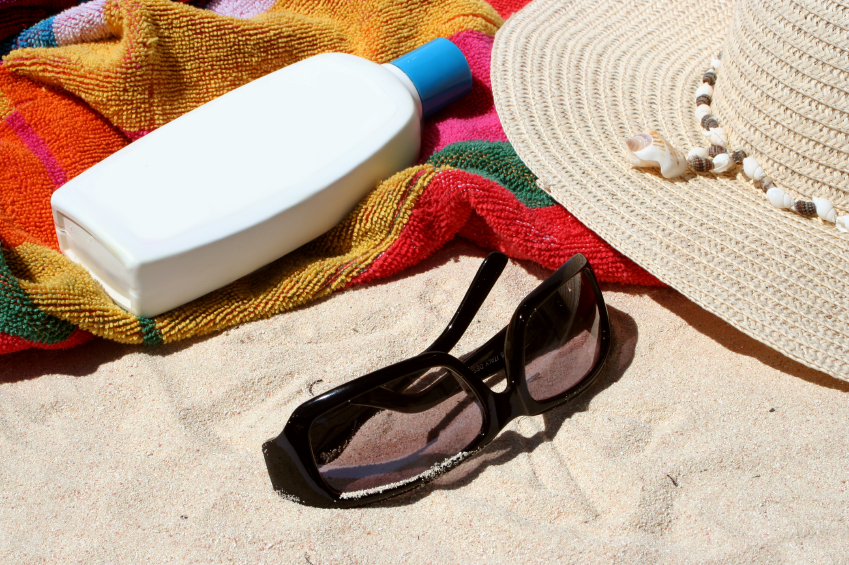 beach bag and beach items and sun block