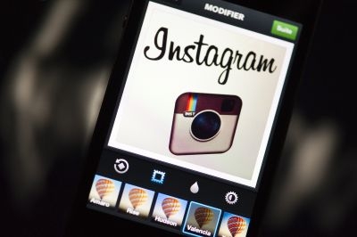 The former Instagram logo displayed on a smartphone.