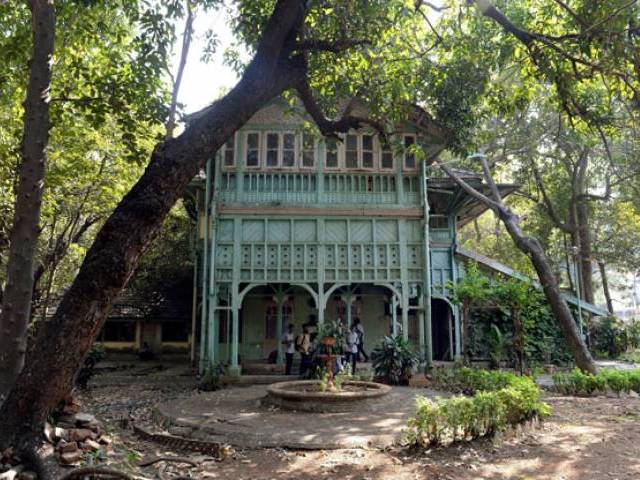 In this photo taken on February 5, 2016, Indian students gather under the porch of the Kipling Bunglow - the birthplace of author Rudyard Kipling - inside the campus of the J.J. School of Art in Mumbai -courtesy AFP