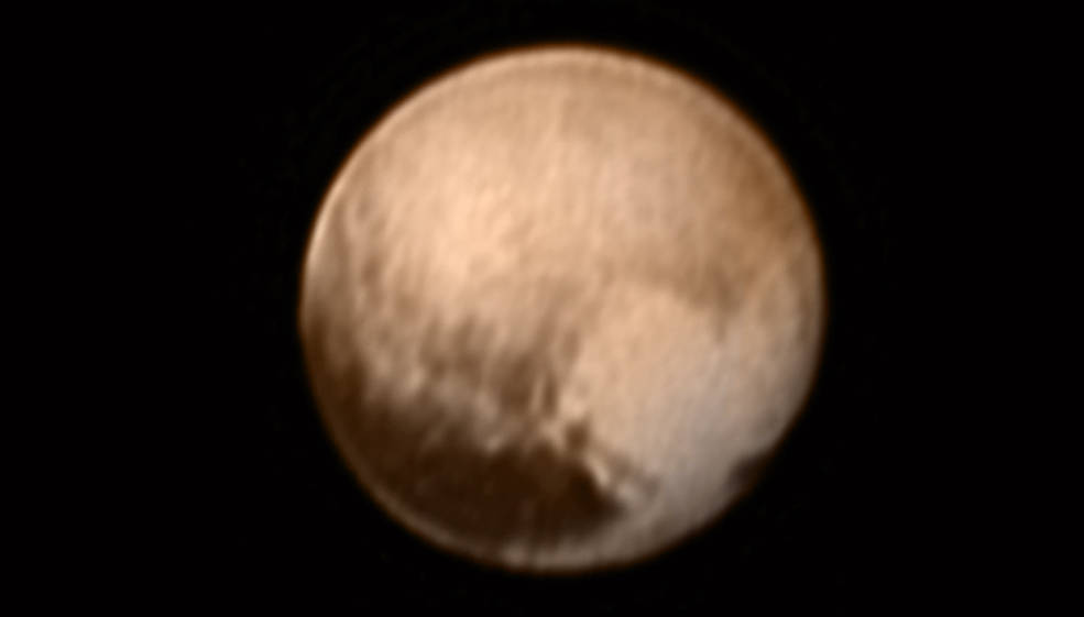 This image of Pluto from New Horizons’ Long Range Reconnaissance Imager (LORRI) was received on July 8, and has been combined with lower-resolution color information from the Ralph instrument. Credits: NASA-JHUAPL-SWRI