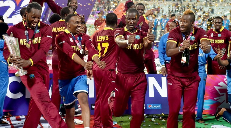 Kolkata: West Indies Captain D Sammy with teammates and trophy celebrates after beating England in the ICC World T20 final match at the Eden Gardens in Kolkata on Sunday. PTI Photo by Swapan Mahapatra (PTI4_3_2016_000324b)