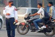 police fining bikers without helmets