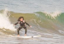 The 9 year old surfing