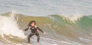 The 9 year old surfing