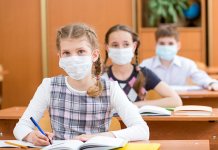Students attending school with masks