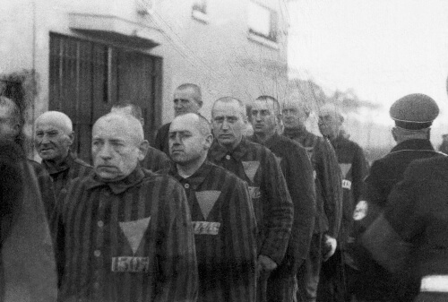 The prisoners at concentration camps with the symbol on their uniform.