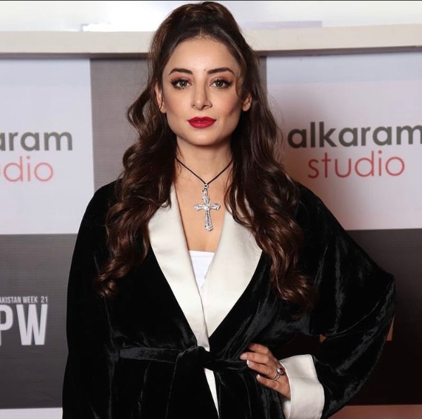 sarwat gillani cross necklace