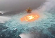 gulf of mexico and fire erupts