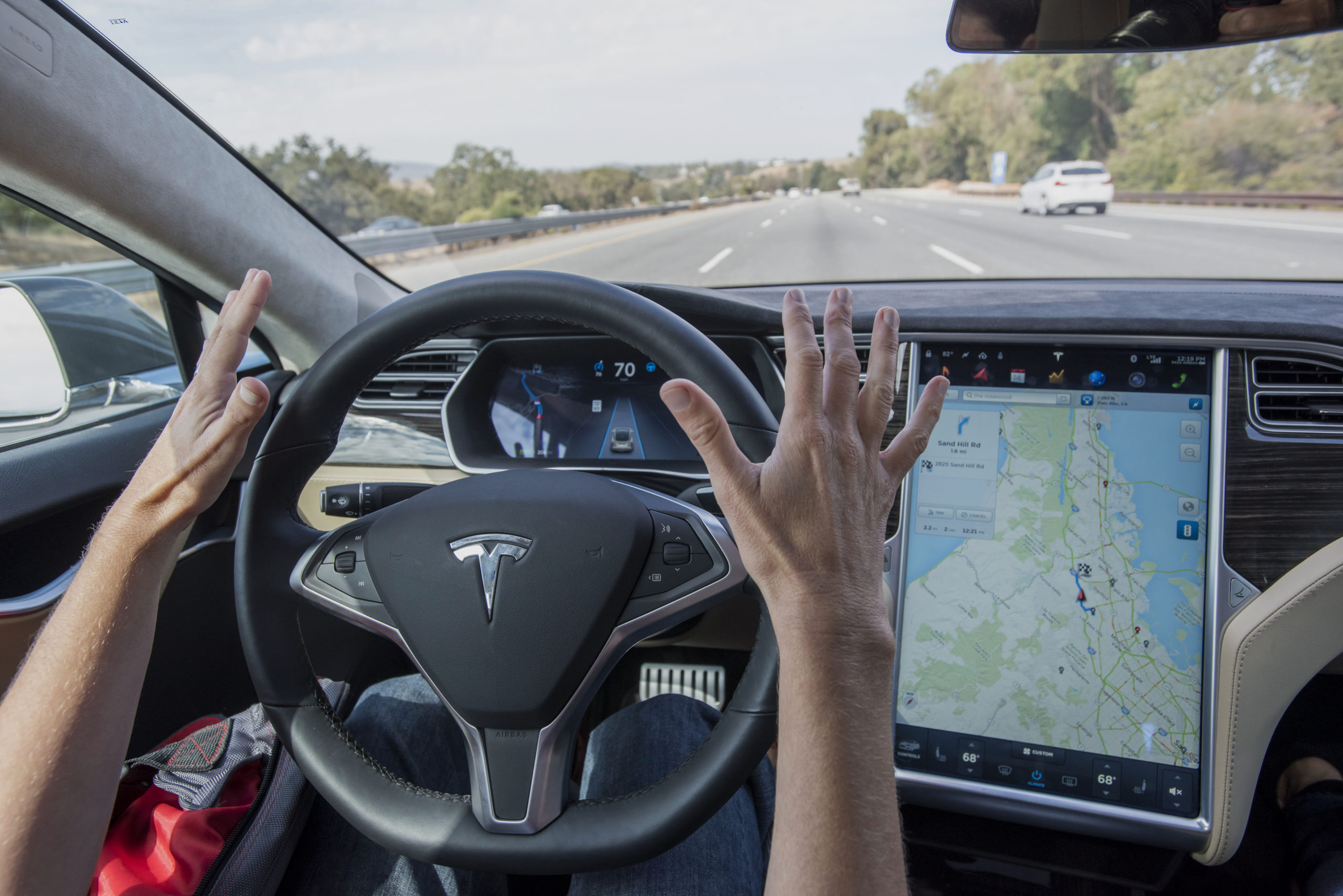 tesla employee coming to work at Apple