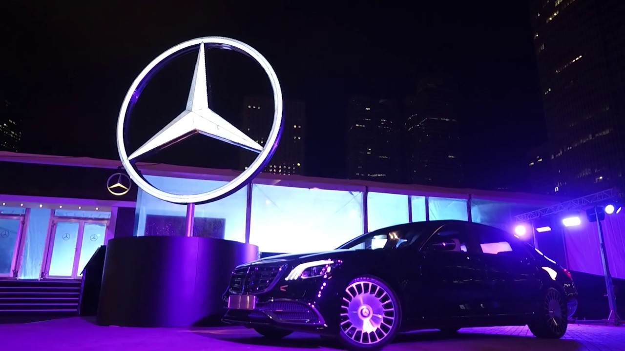 mercedes and a car brand at event