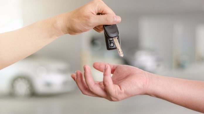 Handing over keys to car