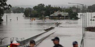 One Dead, Thousands Urged to Evacuate as Floods Hit Australia’s Northeast