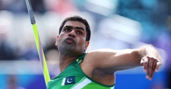 Arshad Nadeem throwing a javelin
