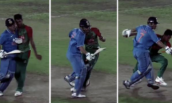 Dhoni-Pushes-Bangladesh-Bowler-Mustafizur-Rahman