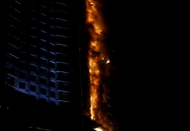 A fire engulfs The Address Hotel in downtown Dubai in the United Arab Emirates December 31, 2015. REUTERS/Ahmed Jadallah